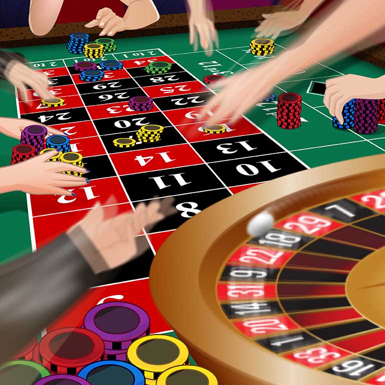 Roulette players placing their bets